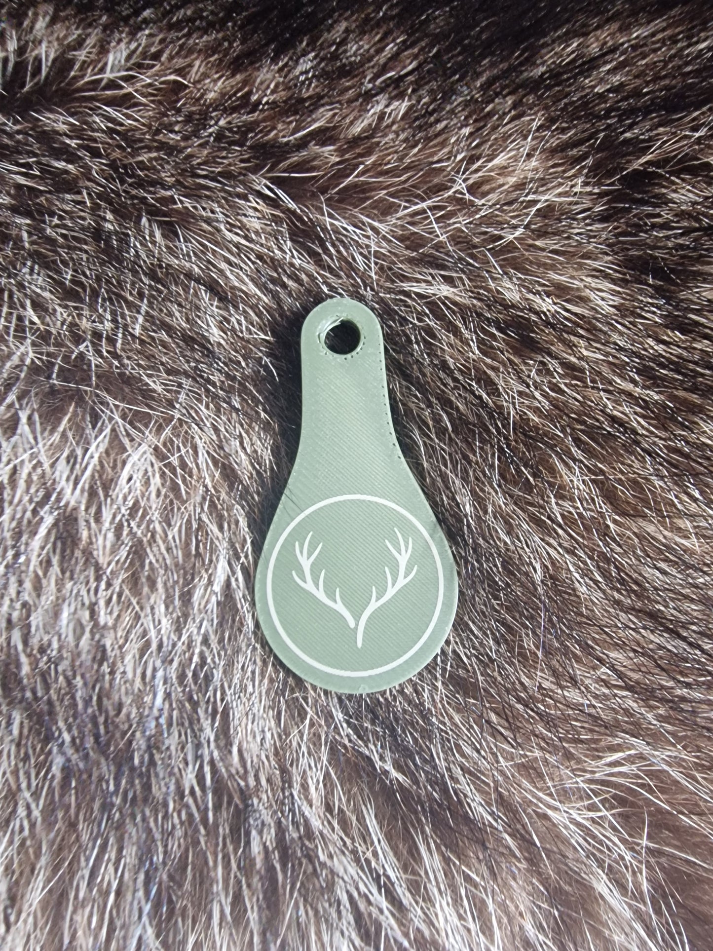 Einkaufswagenöffner mit jagdlichen Motiven